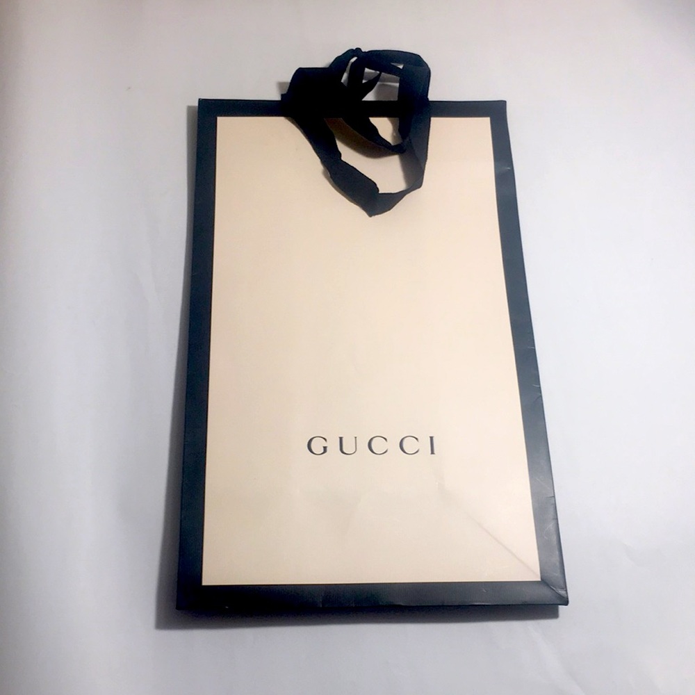 Genuine Gucci Shopping Bag with Grosgrain ribbon handles and bag ties.
